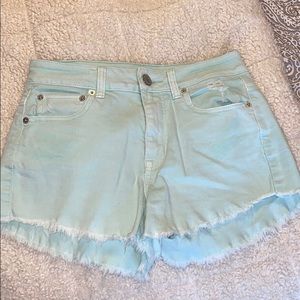 AE Size 4 faded light green blue shorts
